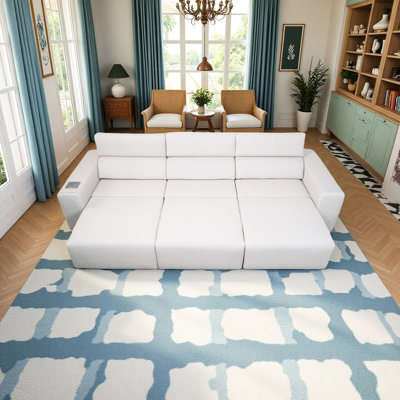 Sofa 3 places inclinable électrique avec système stéréo, chargeur sans fil et poche latérale. Profondeur ajustable, deux modes de contrôle, éclairage d'ambiance. Parfait pour une sieste dans le salon de votre appartement. Sofa gris.