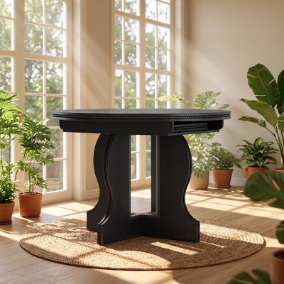 Table de salle à manger ovale extensible RARLON en MDF, dimensions : 110 cm (L) x 110 cm (P) x 151 cm (H).