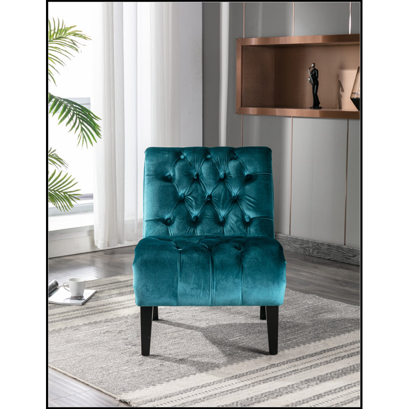 Fauteuil d'appoint confortable en velours sans accoudoirs pour diverses pièces, rehaussant le style intérieur