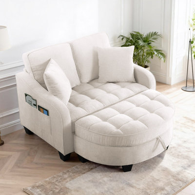 Canapé-lit ergonomique avec repose-pieds de rangement, revêtement en velours côtelé et coussins décoratifs