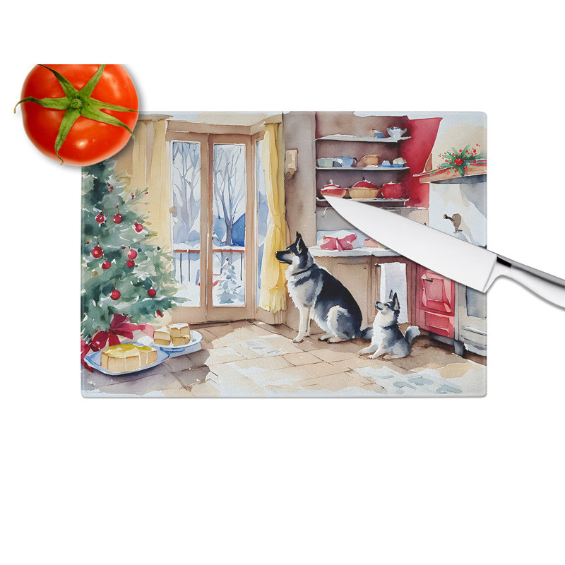 Planche à découper en verre avec des biscuits de Noël norvégien
