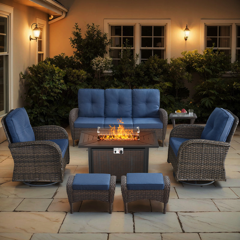 Valierius 7-Piece Outdoor Wicker Set With Fire Pit, 3-Seater Sofa, Swivel Chairs & Ottomans, Blue