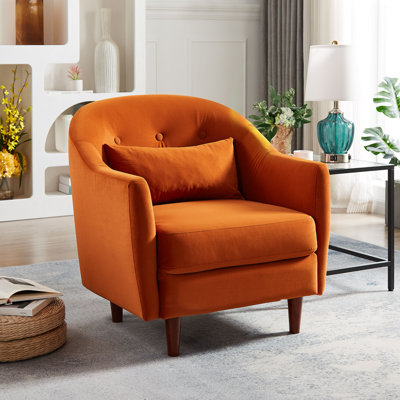 Fauteuil capitonné avec coussin