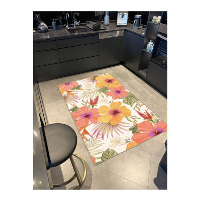 Tapis à motif floral Blooming avec base tissée, lavable à la machine
