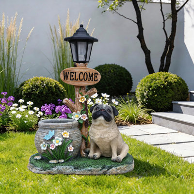 Statue de planteur de chien carlin assis