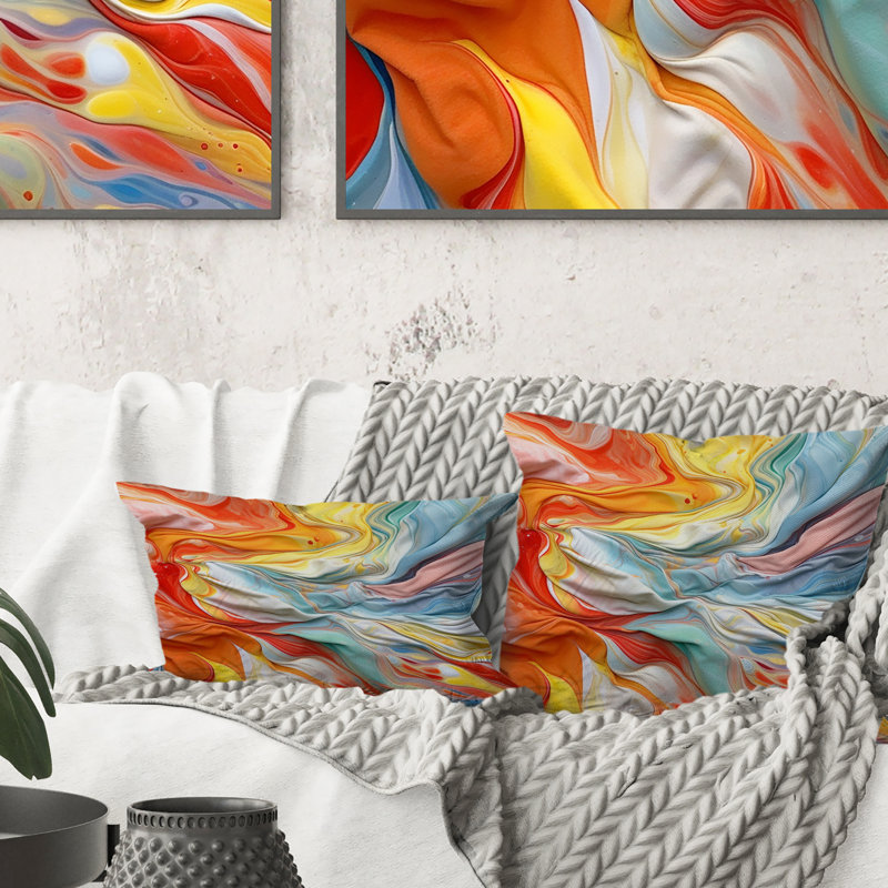 Coussin décoratif orange et bleu à motif abstrait