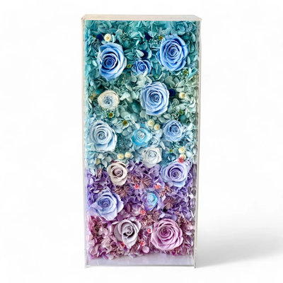 Arrangement floral dans une boîte