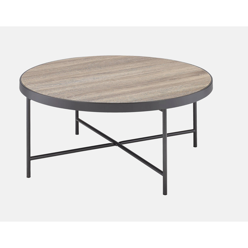 Table basse robuste de style industriel avec mélange de métal et de bois