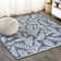 Mechling Nevis Palm Frond Navy/Ivory Indoor/Outdoor Rug