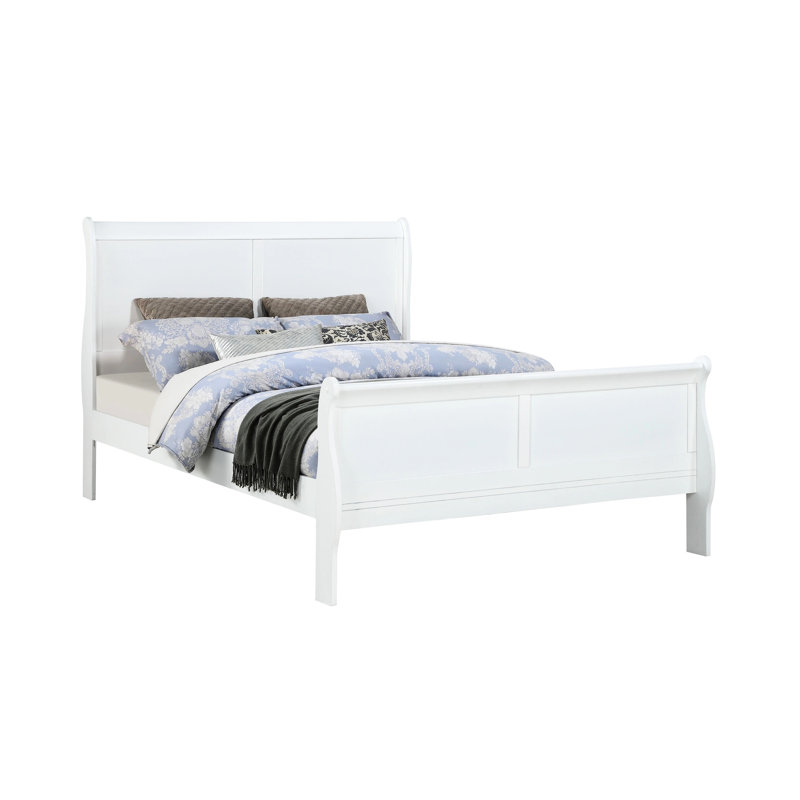 Grand lit blanc en bois massif pour une sensation douillette de détente