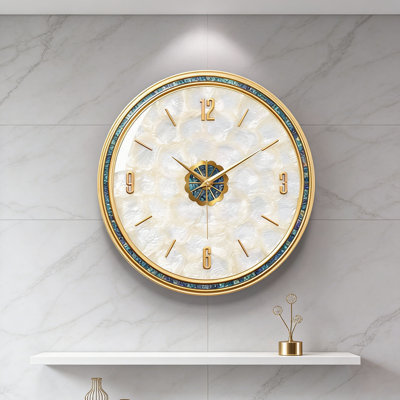 Horloge murale de luxe en nacre avec cadre doré
