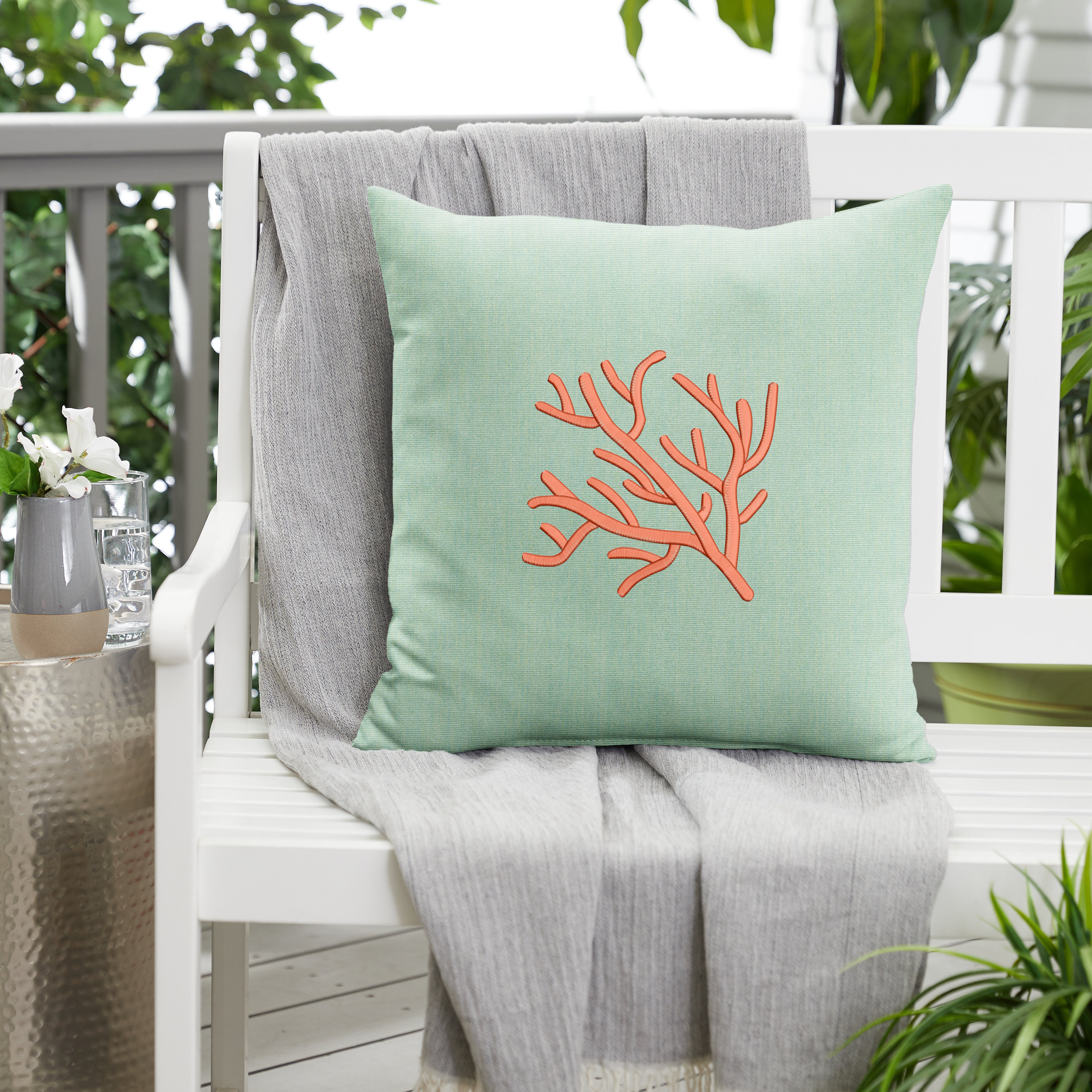https://assets.wfcdn.com/im/55869136/compr-r85/2003/200320890/granjeno-indooroutdoor-square-embroidered-pillow-coral.jpg