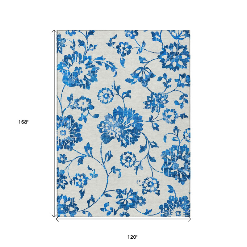 Tapis extérieur lavable floral blanc et bleu denim 10 pi x 14 pi