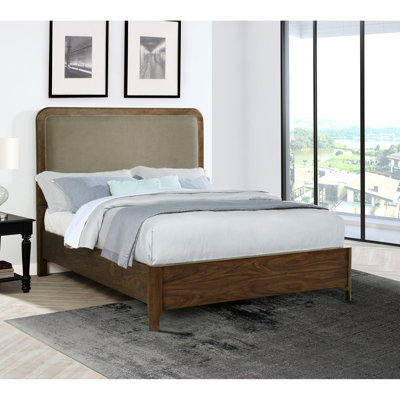 Grand lit tapissier en noyer, coins arrondis et tissu taupe rembourré pour une chambre à coucher d'ambiance décontractée