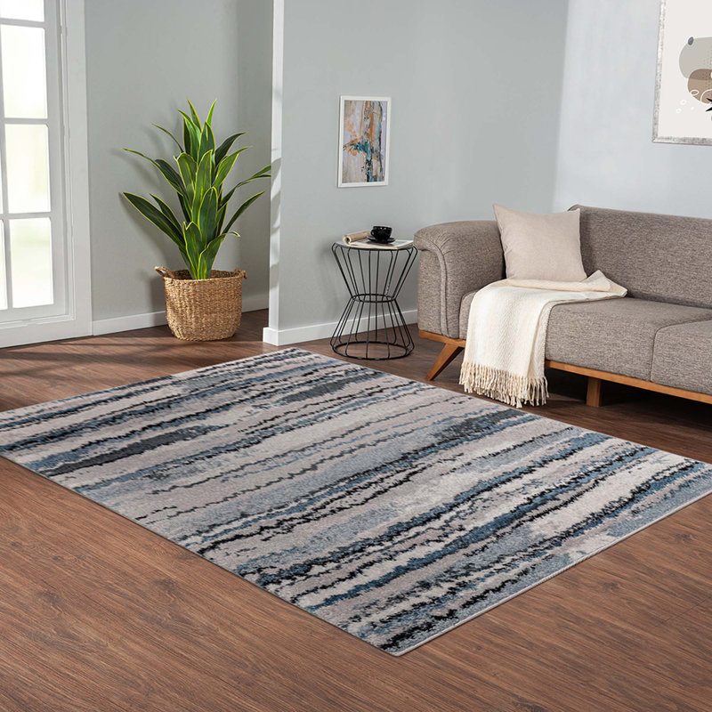 Tapis tissé à rayures bleues