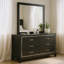 Commode large Lyla, garniture argentée, 6 tiroirs, pieds fuselés, bois noir
