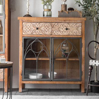 Armoire en bois sculpté, portes en verre et métal