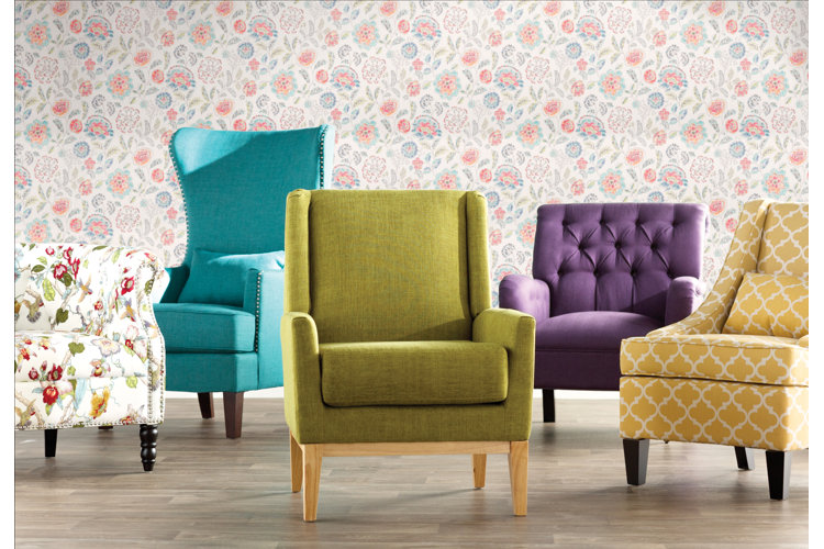 five accent chairs in green, purple, yellow, blue, and floral patterns