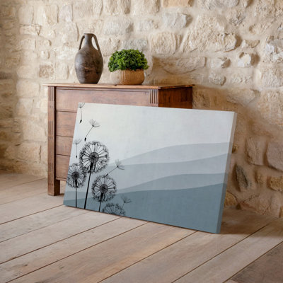 Toile de conception minimaliste avec des silhouettes délicates de pissenlit sur le côté gauche de l'art mural avec un fond beige clair pâle