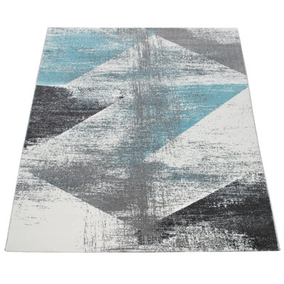Tapis turquoise / gris / crème à motif abstrait en polypropylène tissé à la machine Everline
