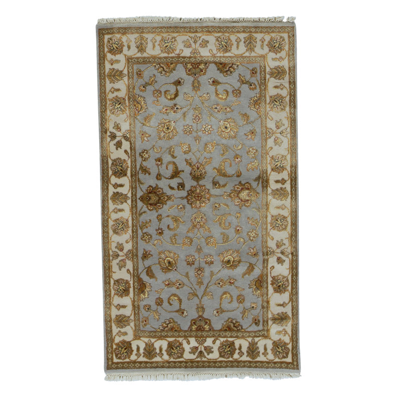 Tapis bleu et ivoire de haute qualité noué à la main
