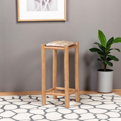 Tabouret de bar Atara rustique avec revêtement en cuir de chèvre authentique et structure en bois de teck