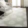 Candelo Hand Tufted Wool/Viscose Floral Rug in Gray/Ivory