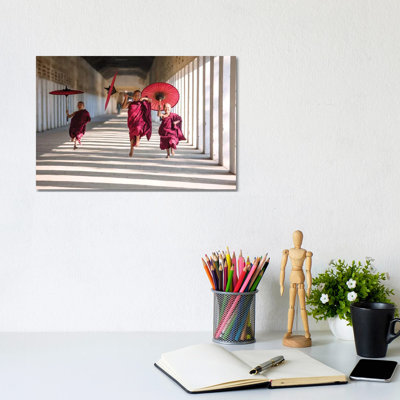 Three Monks Running, Burma by Matteo Colombo - Wrapped Canvas Print