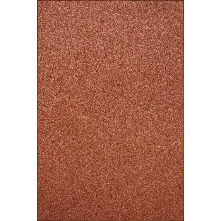 Ebern Designs Solid Color Area Rug Rust