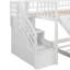 Lit simple au-dessus d'un lit superposé blanc avec accès en toute sécurité et glissade agréable - fabrication stable de tiroirs de rangement ludiques