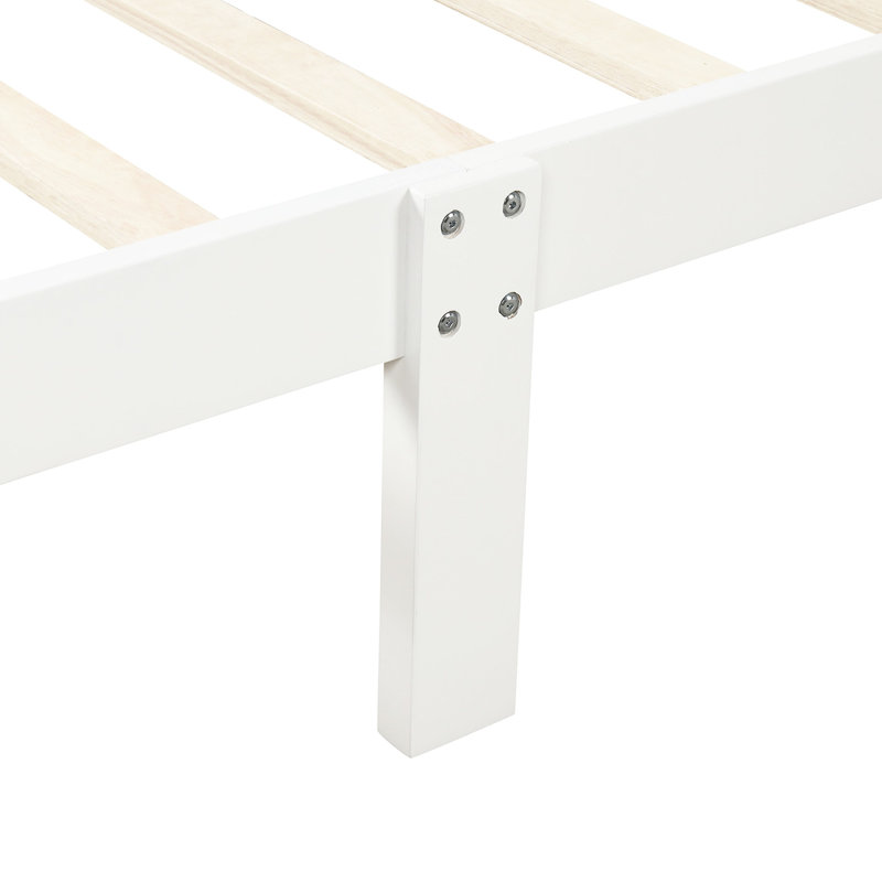 Lit simple en bois massif avec tête de lit et plateforme blanche
