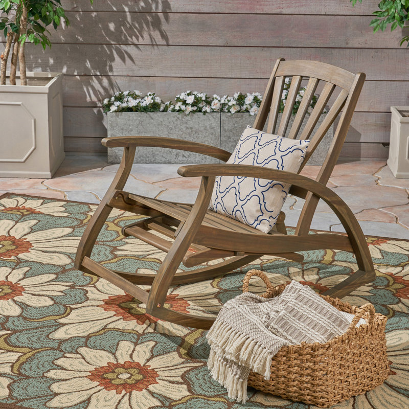 Fauteuil à bascule en bois gris avec résistance aux intempéries et repose-pieds