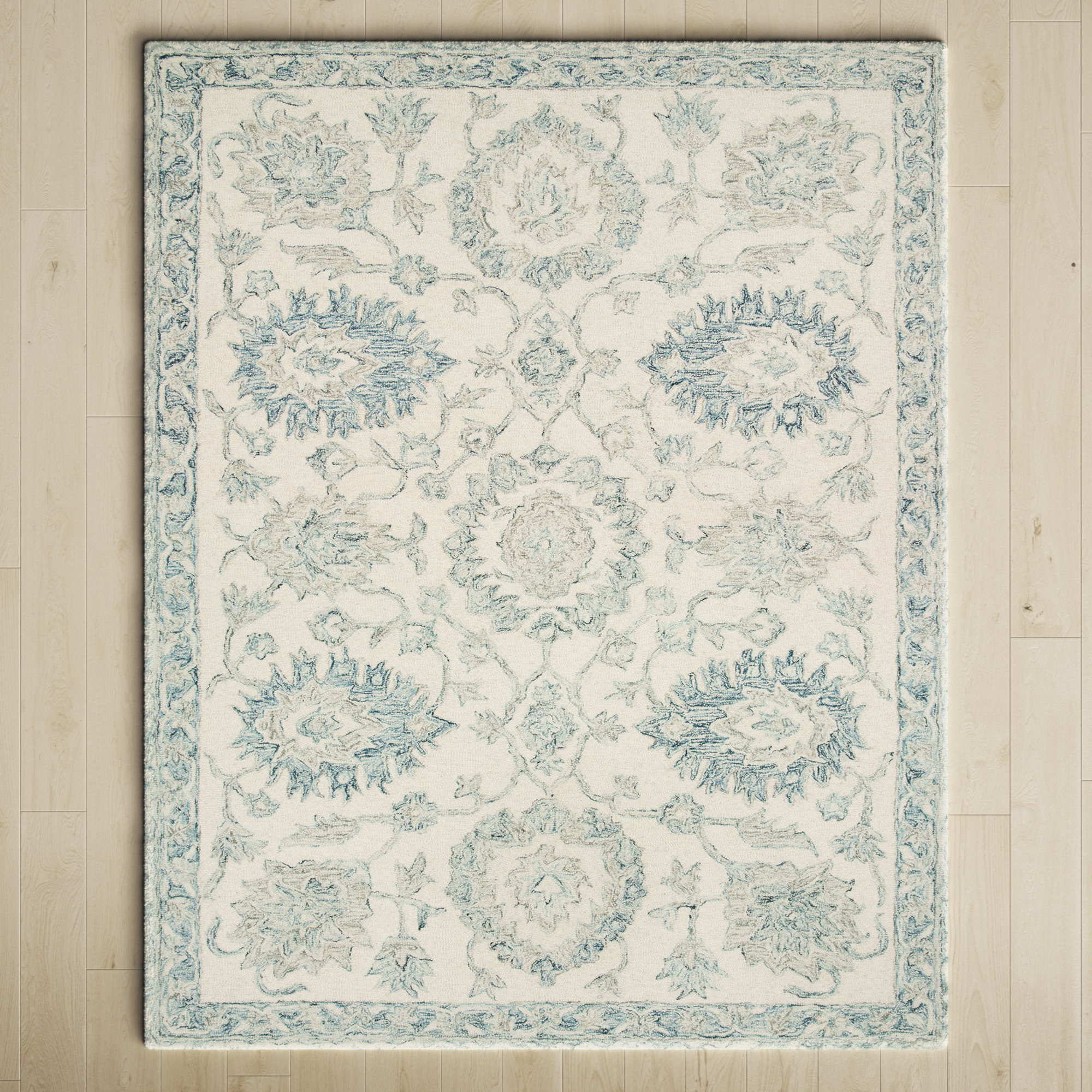 https://assets.wfcdn.com/im/55929189/compr-r85/1715/171505345/aden-handmade-hand-hooked-wool-ivoryblue-rug.jpg