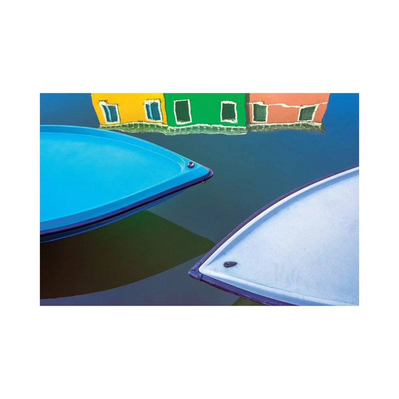 Italy, Burano. Boat Bows And House Reflection In Canal. by Jaynes Gallery - Wrapped Canvas Print
