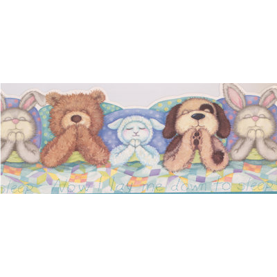 Ours en peluche endormi sur le lit