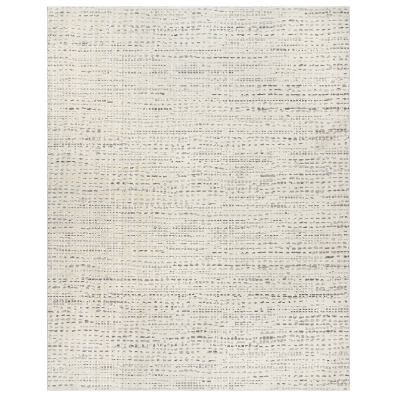 Ivory and Gray Tufted Polka Dot 5' x 7' Synthetic Rug