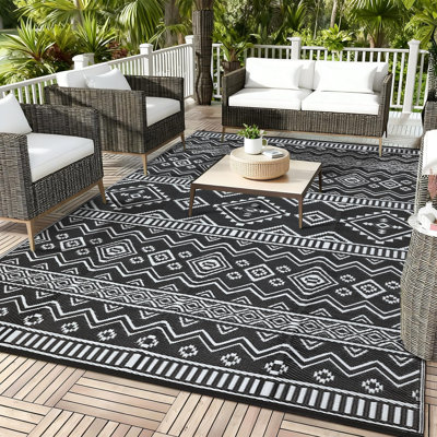 Tapis extérieur noir et blanc à motif géométrique 10 x 14 pi - Tapis de patio lavable, imperméable et résistant aux rayons UV, facile à nettoyer et léger - Spécifications des États-Unis
