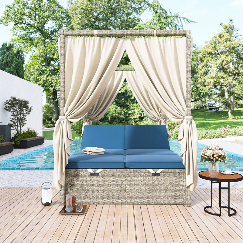 Lit de jour d'extérieur en osier avec auvent et coussins bleu foncé, meubles de patio avec sièges réglables