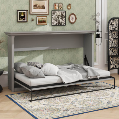 Lit mural simple qui s'effondre dans une armoire