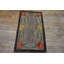 Tapis à motif floral abstrait gris