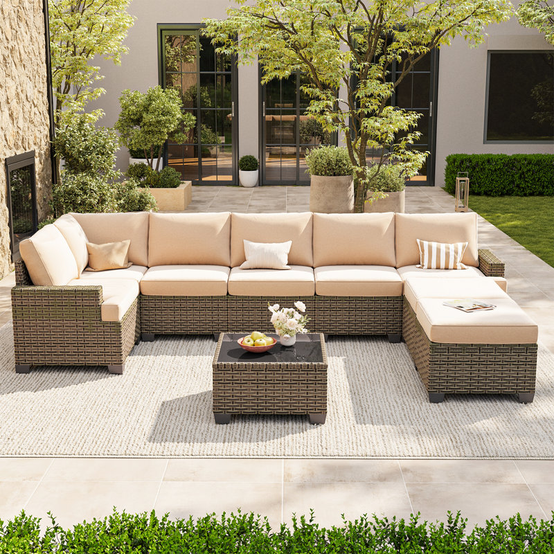 Ensemble de conversation modulaire de patio 9 pièces en résine tressée spéciale PE avec coussins de 10 cm et table basse