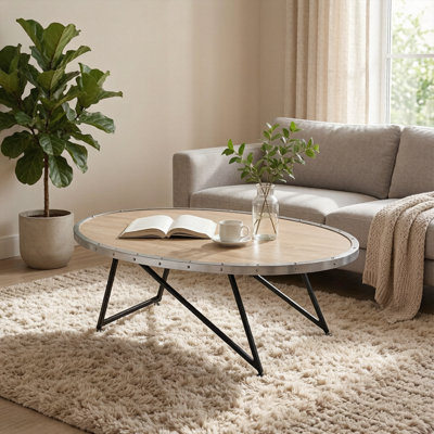 Table basse ovale moderne et épurée avec plateau en bois gris vieilli et piètement en métal