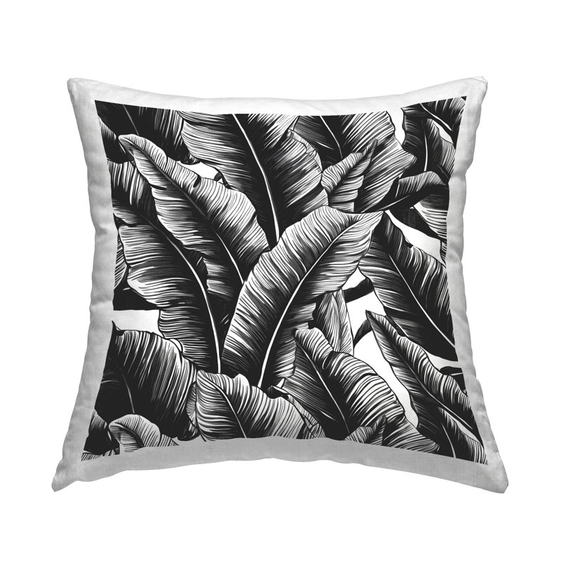 Coussin décoratif noir à motif de frondes audacieuses imprimé par Walker Noble