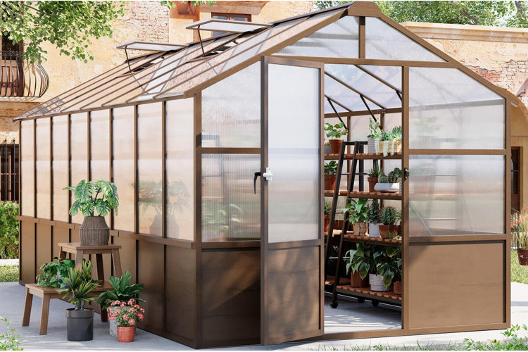outdoor polycarbonate greenhouse with brown frame, adjustable roof vents, and potted plants displayed on interior shelving.