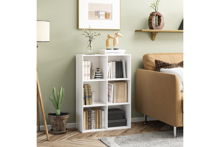 books organized on shelf by height