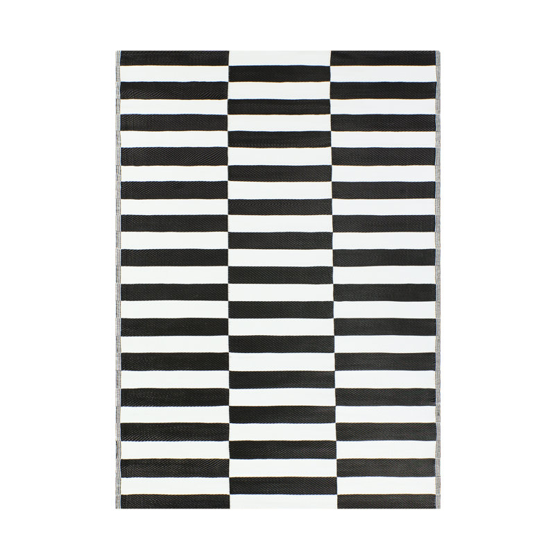 Black and White Reversible Synthetic 6' x 9' Outdoor Rug