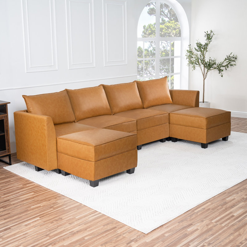 Canapé modulaire 4 pièces en cuir avec repose-pieds double Air