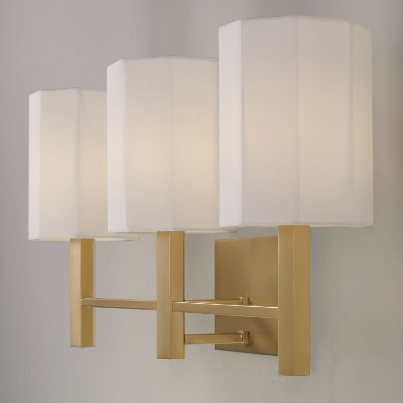 24.25" W x 11.25" H 3-Light Vanity in Aged Brass with Octagonal White Fabric Shades