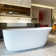 63'' X 29.5'' Matte White Freestanding Soaking Solid Surface Bathtub With Pop-up Drain And Overflow