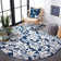 Ammundsen Floral Navy/Ivory Area Rug